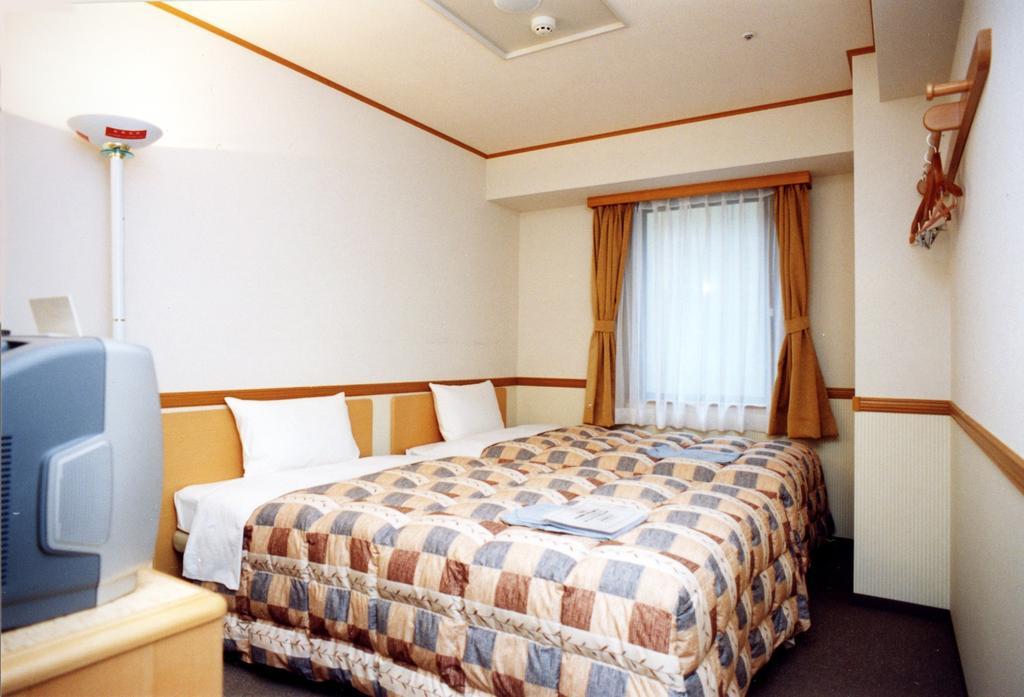 Toyoko Inn Hokkaido Sapporo-Eki Kita-Guchi Exterior foto